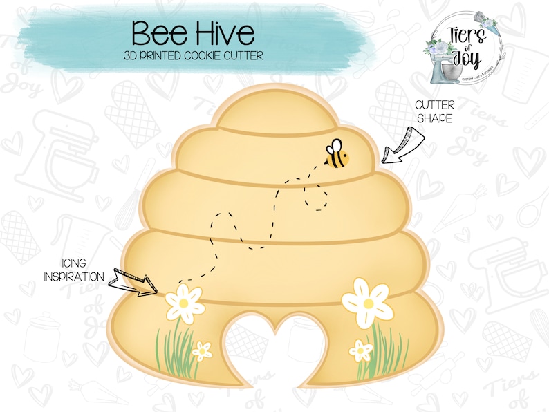 May include: A 3D printed cookie cutter shaped like a beehive with a bee flying around it. The cutter is yellow and has a heart-shaped opening at the bottom. The image also includes the text "Bee Hive" and "3D Printed Cookie Cutter".