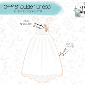May include: A white off-shoulder dress cookie cutter with a floral accent. The text "Off Shoulder Dress" and "3D PRINTED COOKIE CUTTER" are displayed above the dress. The cutter shape is indicated with an arrow.