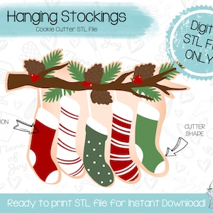 May include: Digital download STL file for a cookie cutter of five hanging Christmas stockings on a branch with pine needles and pine cones. The text "Hanging Stockings" and "Cookie Cutter STL File" is at the top of the image. The text "Digital STL File ONLY" is in a blue circle at the top right of the image. The text "Ready to print STL file for Instant Download!" is at the bottom of the image.