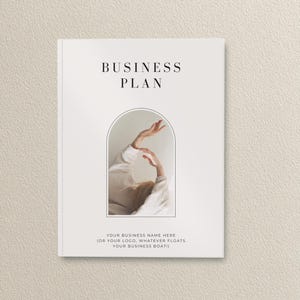May include: A white business plan cover with the title "BUSINESS PLAN" in a serif font. The cover features an arched frame with a photo of a person's arms raised. Text below reads "YOUR BUSINESS NAME HERE (OR YOUR LOGO, WHATEVER FLOATS YOUR BUSINESS BOAT!)"