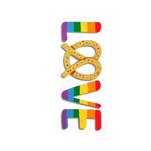 Op de afbeelding: Een sticker met het woord "LOVE" in een verticale opstelling. De letters zijn gekleurd in een regenboogverloop, met een pretzel die de "O" vervangt. De pretzel heeft een lichtbruine kleur met kleine bruine stippen.