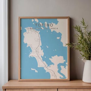 Minimalistische kaartprint Tofino: kustmuurkunst in blauw en wit