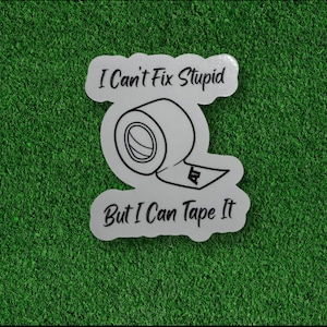 May include: A white sticker with the text "I Can't Fix Stupid But I Can Tape It" and a graphic of a roll of tape. The sticker is on a green background.