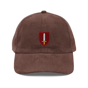Sword Crest Corduroy Hat – Vintage Medieval Fantasy Cap with Embroidered Shield | DnD Gift, Knightcore Hat, RPG Gamer Aesthetic