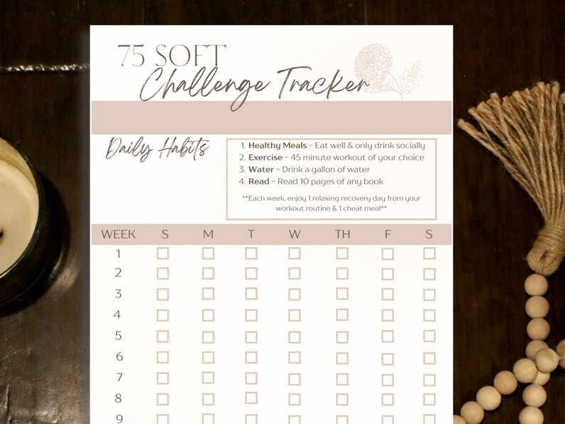 May include: A printable 75-day challenge tracker with a beige background. The tracker includes a checklist for daily habits such as healthy meals, exercise, water intake, and reading. The tracker is divided into weeks and days of the week, with checkboxes for each day.