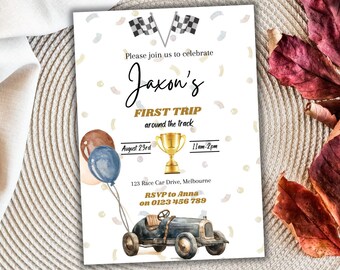 May include: A white invitation with confetti and a blue and brown balloon. The invitation is for Jaxon's First Trip around the track. The date is August 23rd and the time is 11am-2pm. The address is 123 Race Car Drive, Melbourne. RSVP to Anna on 0123 456 789.