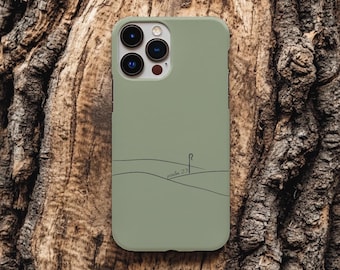 May include: Sage green phone case with a minimalist line drawing of a landscape and the text "psalm 23". The case is shown against a textured brown background.