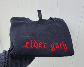 elder goth embroidered crewneck sweatshirt, it was never a phase on the sleeve detail, custom goth punk rock emo apparel, feral mom gift
