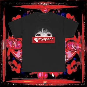 May include: Black t-shirt featuring a graphic of a pale face with black hair and white eyes, above a red rectangle with the word "myspace" in white. The design is centered on the front of the shirt.