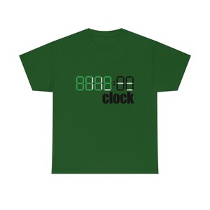 May include: A green t-shirt featuring a black and white digital clock graphic that reads "8888:88 clock".