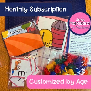May include: A monthly subscription box for children's learning activities. The box includes a variety of items, such as flashcards, manipulatives, and a grid. The box is labeled "Monthly Subscription" and "Customized by Age".