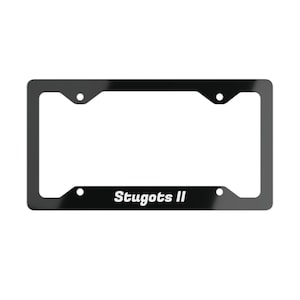 May include: Black license plate frame with the text "Stugots II" in white lettering.