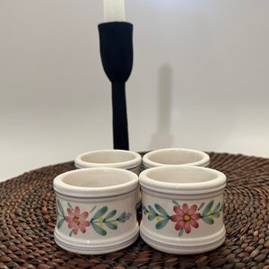 Four Vintage White Porcelain Napkin Rings with Flowers