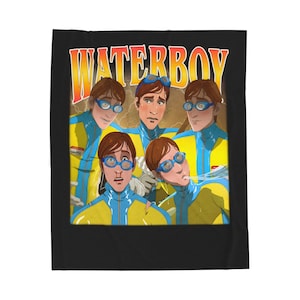 May include: A black blanket featuring a cartoon illustration of five people wearing blue and yellow swimsuits and goggles. The word "WATERBOY" is printed in orange and yellow at the top.