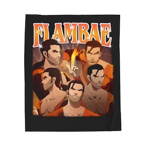 Puede incluir: Manta negra con un gráfico de varios hombres musculosos con ropa naranja y negra, y la palabra "FLAMBAE" en letras de bloque naranja. El fondo tiene rayos y un resplandor de fuego.