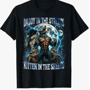 May include: Black t-shirt with a graphic of werewolves under a full moon and lightning. The text "DADDY IN THE STREETS" and "KITTEN IN THE SHEETS" is displayed above and below the graphic.
