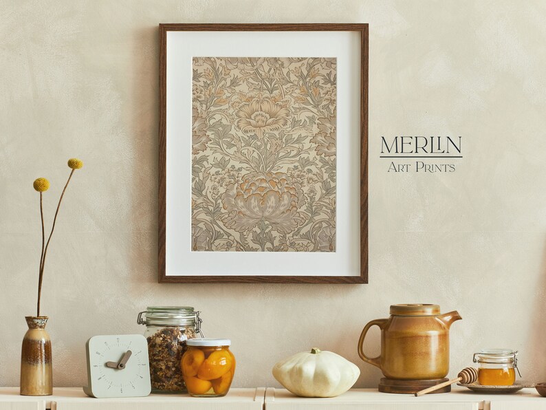 May include: A framed print of a floral pattern in shades of beige, brown, and green. The print is hanging on a beige wall. The text "MERLIN Art Prints" is visible in the bottom right corner of the image.