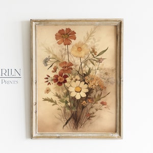May include: A framed print of a vintage botanical illustration featuring a bouquet of dried flowers in shades of brown, orange, and white.