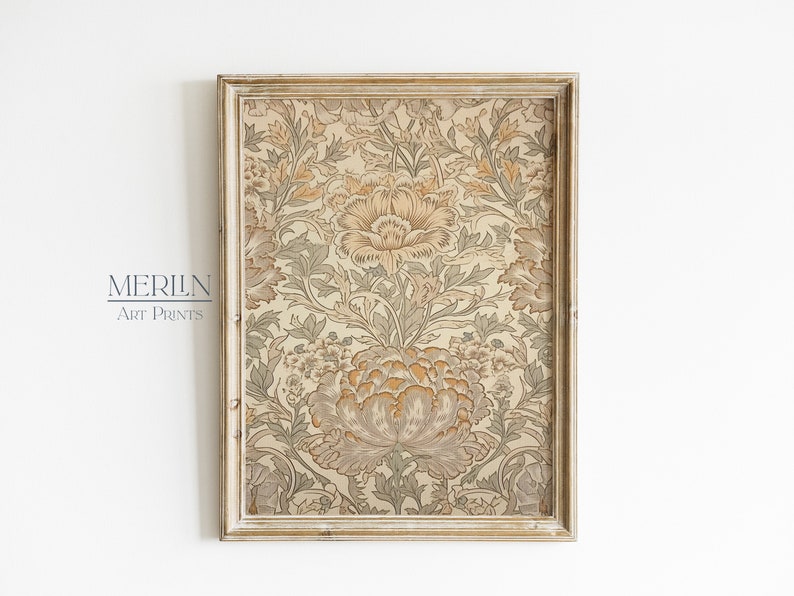 May include: A framed print with a vintage floral pattern in shades of beige, brown, and green. The frame is a light wood color with a distressed finish.
