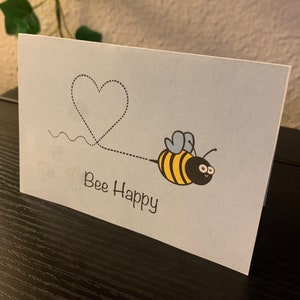 Tarjeta feliz de abeja