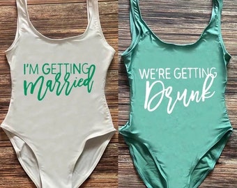 I’m Getting Married and We’re Getting Drunk matching one piece swimsuits for Bride and Bridesmaids