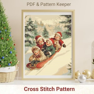 May include: Cross stitch pattern featuring a vintage illustration of four children on a sled in a snowy winter scene. The children are wearing red and white hats and are smiling. The sled is red and has a white stripe down the middle. The background is a snowy forest with trees and a blue sky.
