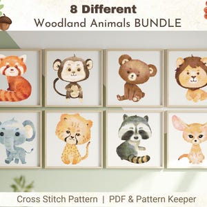 May include: A set of 8 cross stitch patterns featuring woodland animals. The patterns include a red panda, monkey, bear, lion, elephant, cheetah, raccoon, and fennec fox. Each pattern is framed in a white frame and displayed on a light brown wall.