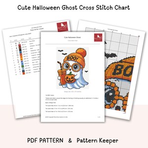 May include: A cross-stitch chart set featuring a cute Halloween ghost design. The ghost wears an orange beanie and glasses, holding a pumpkin drink. The chart includes a color key and a pattern keeper option. The text "BOO!" is visible.