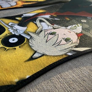 Custom Soul Eater car mats featuring Maka Albarn and her scythe partner, Soul. Inspired by the anime's action-packed adventures, these durable mats bring Death Weapon Meister Academy style to your ride. Perfect for fans of Maka, Soul