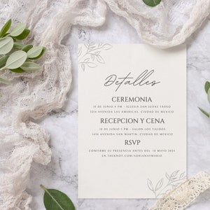 Puede incluir: Una invitaci&oacute;n de boda con fondo blanco y detalles florales grises. El texto dice "Detalles", "Ceremonia", "10 de Junio 4 PM - Iglesia San Judas Tadeo", "3214 Avenida Las Americas, Ciudad de Mexico", "Recepcion y Cena", "10 de Junio 5 PM - Salon Los Tajibos", "1456 Avenida San Martin, Ciudad de Mexico", "RSVP", "Confirme su presencia antes del 10 Mayo 2024", "en theknot.com/adrianymario".