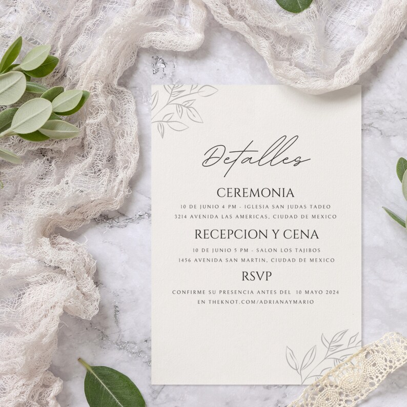 Puede incluir: Una invitaci&oacute;n de boda con fondo blanco y detalles florales grises. El texto dice "Detalles", "Ceremonia", "10 de Junio 4 PM - Iglesia San Judas Tadeo", "3214 Avenida Las Americas, Ciudad de Mexico", "Recepcion y Cena", "10 de Junio 5 PM - Salon Los Tajibos", "1456 Avenida San Martin, Ciudad de Mexico", "RSVP", "Confirme su presencia antes del 10 Mayo 2024", "en theknot.com/adrianymario".