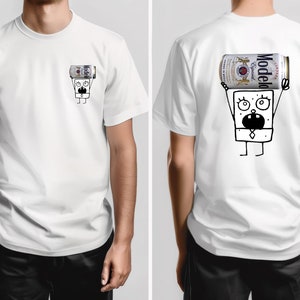 May include: White t-shirt with a black and white cartoon character holding a Modelo Especial beer can on the back. The front of the shirt has a smaller version of the cartoon character holding a beer can.