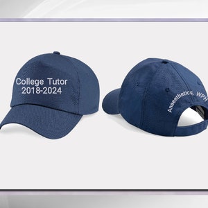 May include: A navy blue baseball cap with the text "College Tutor 2018-2024" embroidered on the front and "Anaesthetics, WPH" embroidered on the back.