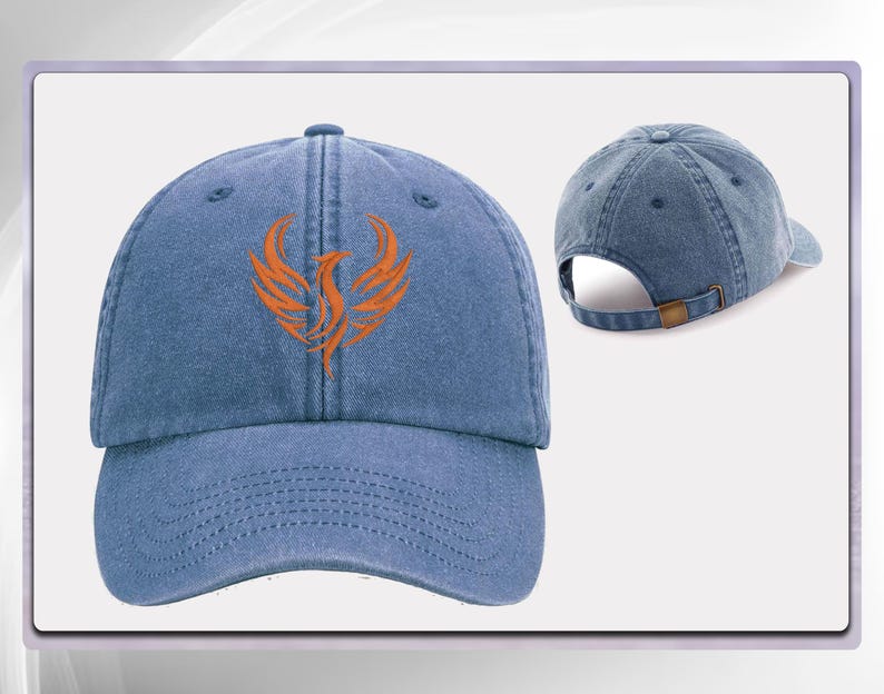 May include: A blue denim baseball cap with an orange phoenix design embroidered on the front. The cap has a curved brim and an adjustable strap.