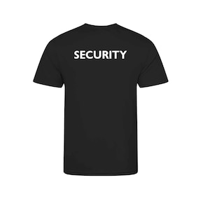 May include: Black t-shirt with the word "SECURITY" printed in white block letters across the back. The shirt has short sleeves and a crew neck. The fabric appears to be a soft, opaque material.
