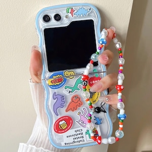 Niedliche Cartoon Dinosaurier Handyhülle für Samsung Galaxy Z Flip 6, 5, 4, 3 mit Anhänger