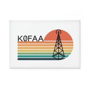 May include: A retro-style illustration of a radio tower with a sunset behind it. The text "KOFAA" is written above the tower.