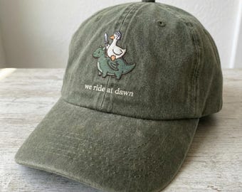 Embroidered We Ride at Dawn Cap, Funny Silly Goose Hat, Chaotic Animal Hat, Whimsical Gamer Gift, Goose Cottagecore Fantasy Dragon Ren Faire