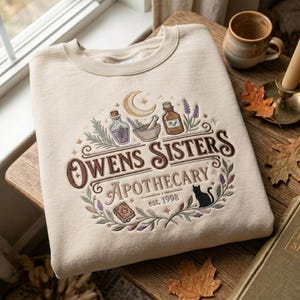 Owens Sisters Apothecary Embroidered Halloween Sweatshirt, Witchy Graphic Shirt, Spooky Season Shirt, Cottagecore Moon Herb Shirt