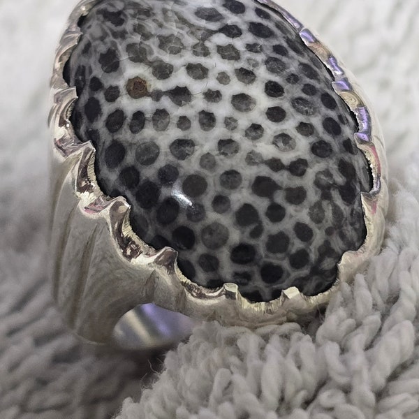A rare, very old, spiritual coral stone ring, white color with black spots