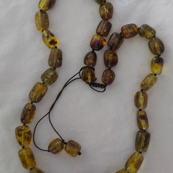 natural rosary made of amber misbaha islamic 33 beads rosary مسبحة من الكرمان القديم الطبيعي المسمى العنبر