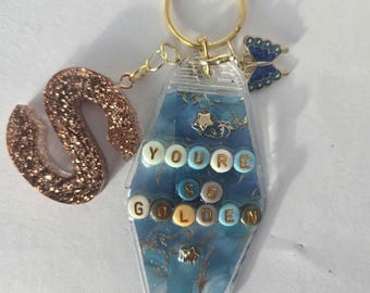Motel Keychain- teal and golden color scheme with *YOURE SO GOLDEN* on one side- other side is blank- free initial letter included!