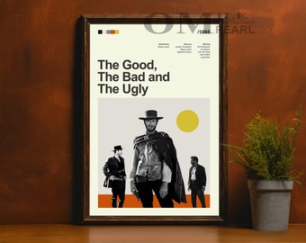 May include: Framed movie poster for "The Good, The Bad and The Ugly" with a minimalist design. The poster features three figures, a yellow sun, and the film's title. The poster is in a dark wooden frame.