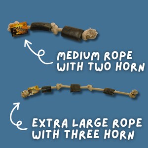 May include: Two dog chew toys made of rope and brown wood. The top toy has two wood pieces and the bottom toy has three wood pieces. The toys are labeled "Toss & Chew".