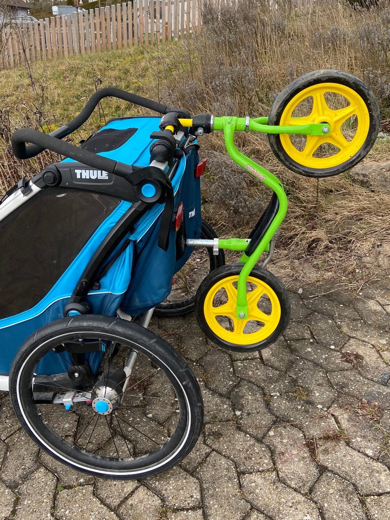 Support de roue Thule Chariot, Sport, Cross, Cabine, Lite, CX1 Porte-vélos pour vélos enfants, draisiennes, scooters, tricycles Peut être installé sans outils image 1