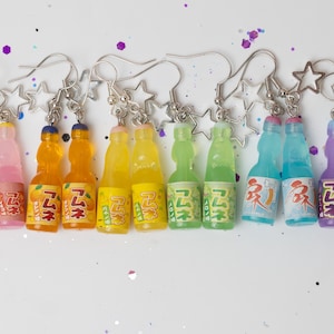 Regenboogoorbellen Japanse frisdrankfles – Kawaii Y2K Cutecore-drankbedel (één vrede)