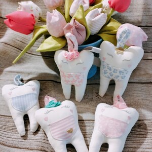 Porta dente da latte, sacchetto per denti