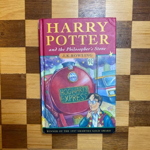 harry potter and the philosopher’s stone by j. k. rowling 11th hardcover edition with double wand error
