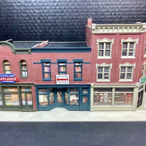 Walthers Cornerstone 933-4041 HO Scale Merchants Row Model Railroad Built Building Design Model Train Gift Hobby Store, Toy Hobby rail