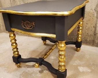 Beautiful black antique table with gold details. Vintage table. Black table. Gold leaf. Table in the foyer. Antique table. Painted table.